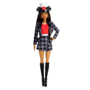 Barbie doll in a plaid outfit with a red top and black hat on a white background