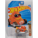 Hot Wheels Duck 'N Roll toy car in its original blister card packaging, featuring an orange duck-shaped race car with sunglasses and a blue Hot Wheels card back.