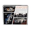 The back of a model kit box showing product details, assembly instructions, and three rendered views of a silver space station model, photographed on a white background.