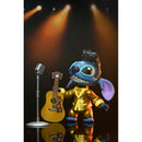 Disney: Lilo & Stitch Ultimate Gold Suit Elvis Stitch NECA Action Figure standing with guitar in front of microphone 