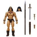 Action figure of a muscular character with accessories on a white background