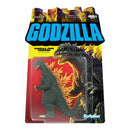 Godzilla action figure in packaging with colorful text and branding