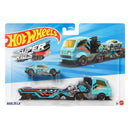 Hot Wheels Super Rigs Haulzilla toy truck in its original blister card packaging, featuring a light blue and black flatbed carrier truck with graphic decals.