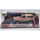 Model of a Chevrolet Blazer with police badge from 'Stranger Things' in packaging