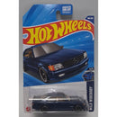 Hot Wheels toy car in packaging with blue car visible