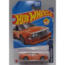 Hot Wheels toy car in packaging with orange BMW design