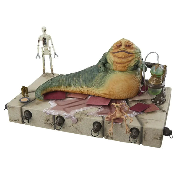 Toy figure of a character resembling Jabba the Hutt from 'Star Wars' on a white background