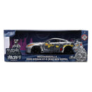 Boxed toy car model of a 2009 Nissan GT-R with MechaGodzilla design on a white background