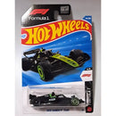 A packaged Hot Wheels Formula 1 die-cast toy car, specifically the Kick Sauber F1 Team car. The black and lime green race car is visible through a clear blister pack on its original blue and red card backing, which features the Hot Wheels logo and Formula 1 branding.