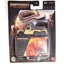 Matchbox The Movie collectible toy vehicle, specifically the Land Rover 95 in a beige and black color scheme, mounted on its original retail blister card packaging.