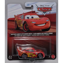 Disney Pixar Cars toy car packaging with Lightning McQueen on a gray background