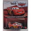 Disney Pixar Cars Lightning McQueen toy car in packaging with race track background