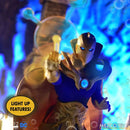 Action figure with glowing elements against a colorful background, featuring the Mezco brand.