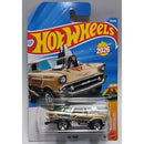 Hot Wheels 2026 Lil' Mad die-cast toy car in its original blister card packaging, featuring a tan and black customized station wagon.