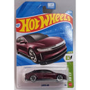 Hot Wheels toy car packaging with a maroon car model inside