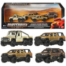 Matchbox The Movie Desert Chase Escape toy set featuring four die-cast off-road vehicles: a tow truck, a pickup, a pickup with trailer, and an SUV, shown both inside the retail box and individually on a white background.