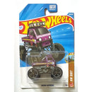 A Hot Wheels 'HW Dirt' Mazda Autozam monster truck toy in its original blister card packaging, featuring a purple truck with a front grill made of teeth.