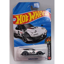 Hot Wheels Mazda MX-5 Miata toy car in packaging on a gray background