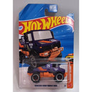 Hot Wheels Mercedes-Benz Unimog 1300L toy truck in packaging on a gray background