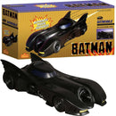 Toy Batmobile in front of its packaging box