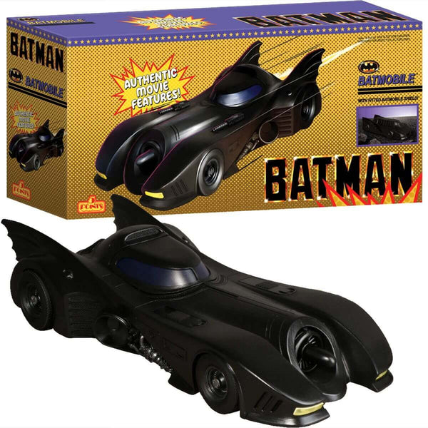 Toy Batmobile in front of its packaging box