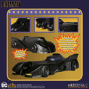 Mezco Toyz Batmobile toy with features listed on a promotional card