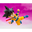 Bandai S.H.Figuarts Dragon Ball Daima Son Goku Mini Action Figure jumping in air with left leg kicking far out and left arm and fist out in front of face