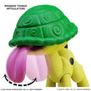 Odie with green shell, pink tongue, and yellow body on a white background