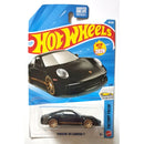 Hot Wheels die-cast toy car of a 2026 Porsche 911 Carrera T, shown in its original blister pack on a white background.