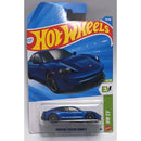 A Hot Wheels die-cast toy car of the Porsche Taycan Turbo S