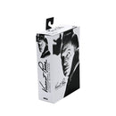 Box packaging of a Vincent Price action figure with black and white portrait on a white background