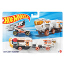 Hot Wheels Super Rigs Red Planet Transport 2-pack toy set in its original blister packaging, featuring a white and orange dump truck and a white and orange off-road vehicle.