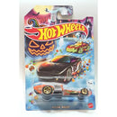 Hot Wheels Rockin' Baler die-cast toy car in its original blister card packaging, featuring a Halloween-themed background with a jack-o'-lantern and candy graphics.