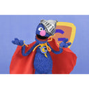 Blue puppet character with a knight helmet and red cape on a blue background