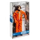 Barbie doll in an astronaut suit packaging with 'Inspiring Women' branding.