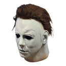 White Halloween Michael Myers mask with brown hair on a white background