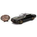 Black Pontiac Firebird model car with 'Smokey and the Bandit' badge on a white background