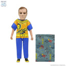 Action figure with a shirt featuring a 'Star Trek' logo and a patterned blanket on a white background.