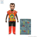 Action figure in red and yellow costume with Star Trek 60th anniversary logo, next to patterned cloth.