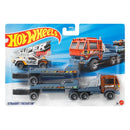 Hot Wheels Super Trucks toy set featuring the Straight Freightin double-axle truck in orange and blue, along with a sports car and a cab-over truck, all in their original blister card packaging.