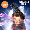 Godzilla figure with glowing effects and 'GODZILLA' branding on a dark background