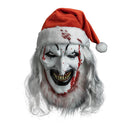 Horror-themed mask with Santa hat on a white background