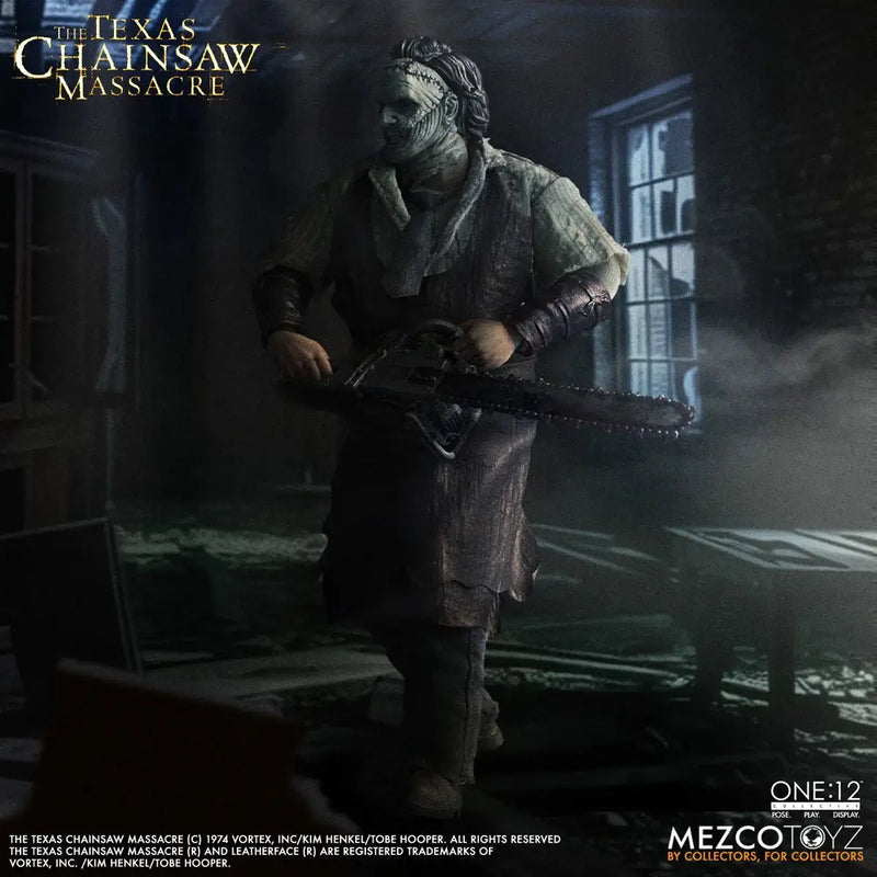 Action figure from 'The Texas Chainsaw Massacre' holding a chainsaw in a dark, eerie setting.
