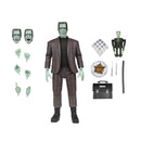 The Munsters ultimate Herman Action figure with accessories on a white background