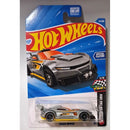 A Hot Wheels die-cast toy car in its original blister packaging, featuring the 'Track Ripper' model. The packaging displays a blue background with the iconic red and yellow Hot Wheels logo and an illustration of the gray and orange car.