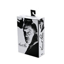 Product packaging with a black and white portrait of a Vincent Price on a white background