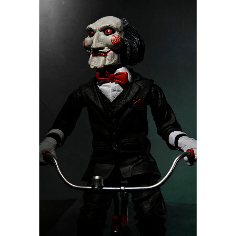 NECA Saw Billy the Puppet & Tricycle 12″ Action Figure with Sound, closeup, looking to the side