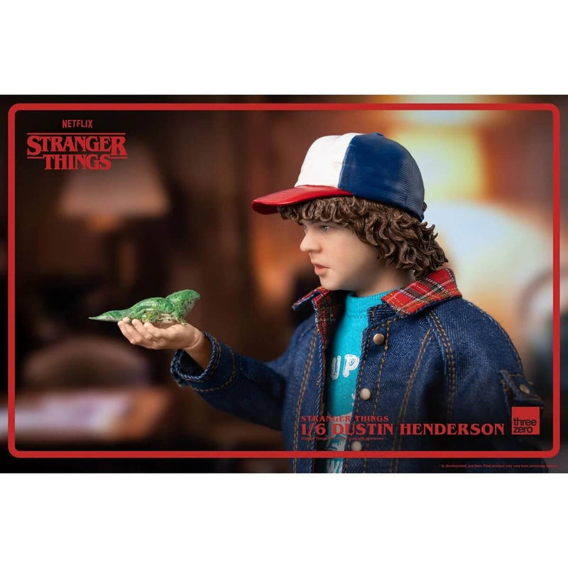 Threezero Stranger Things Dustin Henderson 1:6 Scale 9" Action Figure holding D'Art