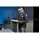 NECA Universal Monsters Ultimate Invisible Man 7″ Scale Action Figure, standing reading notebook