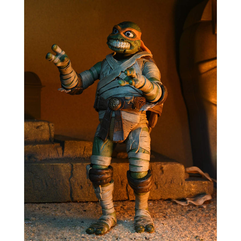 NECA Teenage Mutant Ninja Turtles Michelangelo as The Mummy 7” Scale Action Figure with alternate head